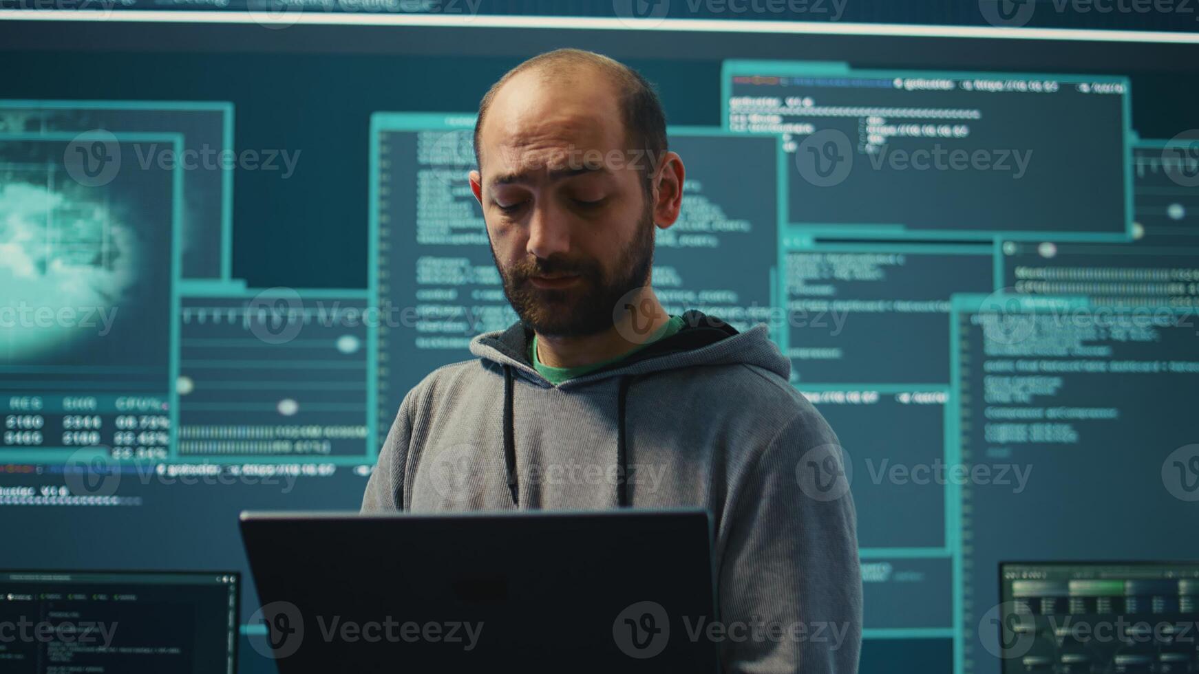 Governmental hackers breaching network security with advanced techniques, cyber defense in action. Team of IT experts working on gaining access to collect information, big screen. Camera B. photo