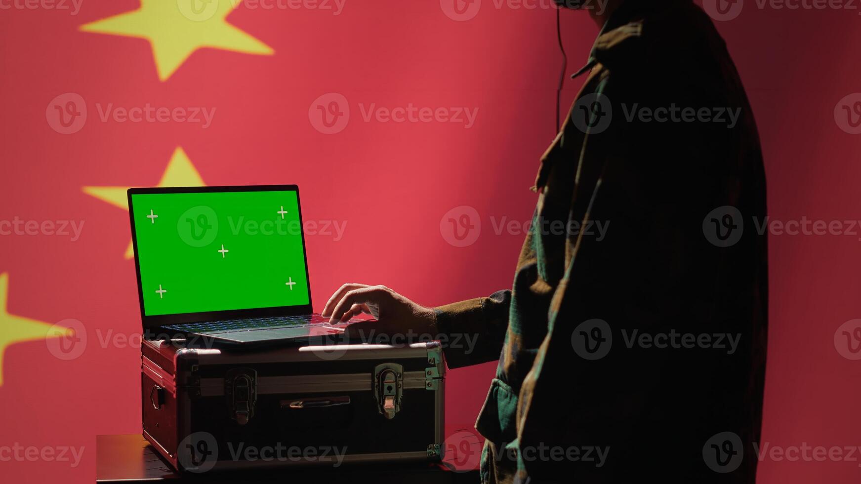 Chinese air defense using radar system on green screen laptop to detect intercontinental ballistic missiles. Republic of China army soldier scanning rockets with mockup notebook, camera A photo