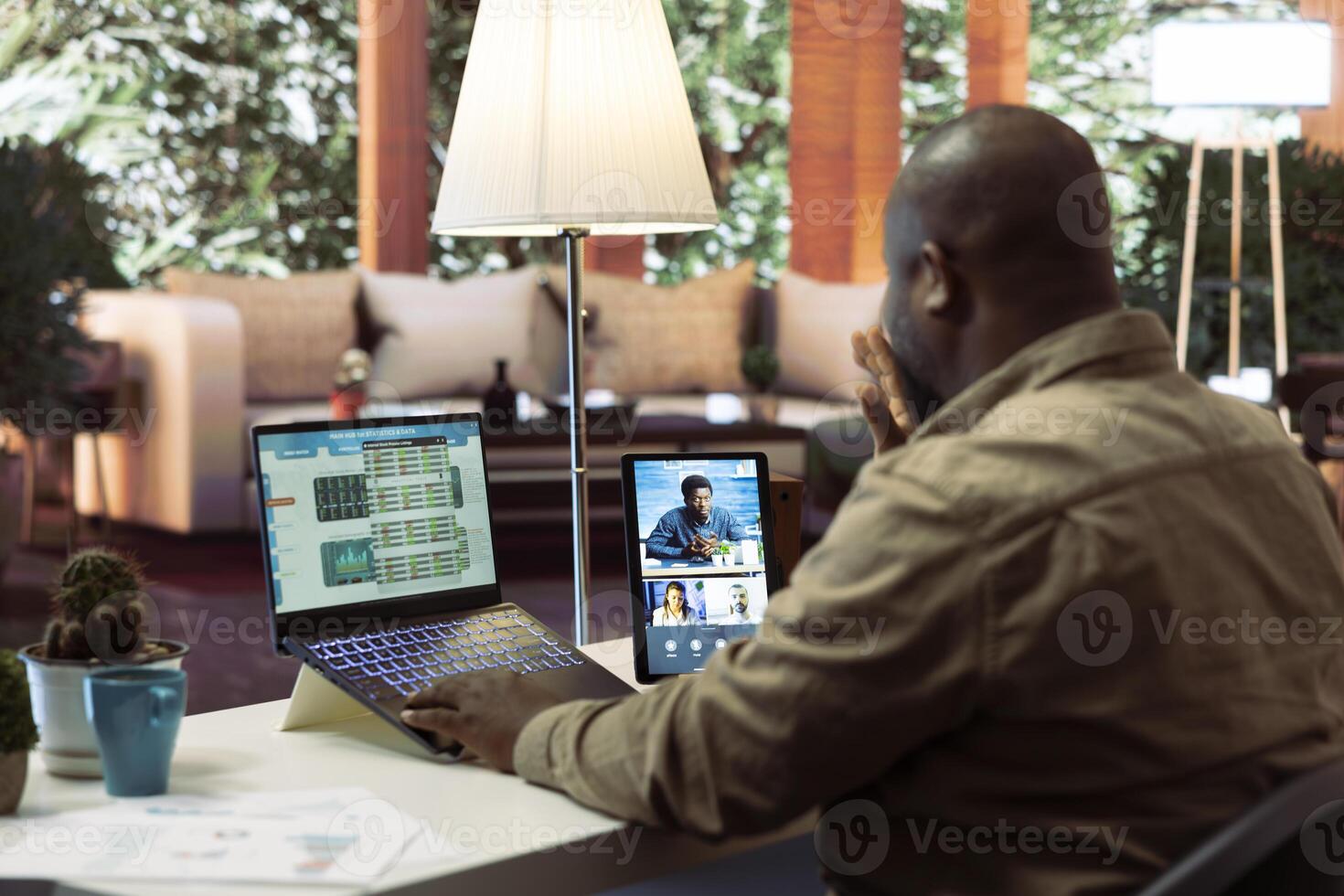 Business owner meeting on videoconference call with shareholders to obtain funding for the development project. Entrepreneur attends important startup conference at his house, budget growth. photo