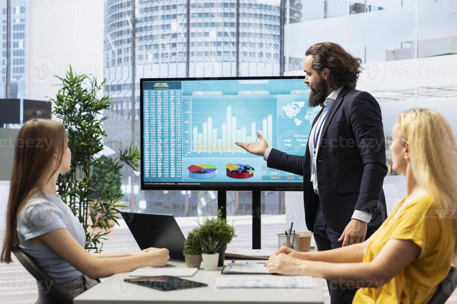 Financial adviser presents market analytics to clients using large screen, emphasizing data driven decision making. Broker showing statistical charts about stock exchange indicators photo