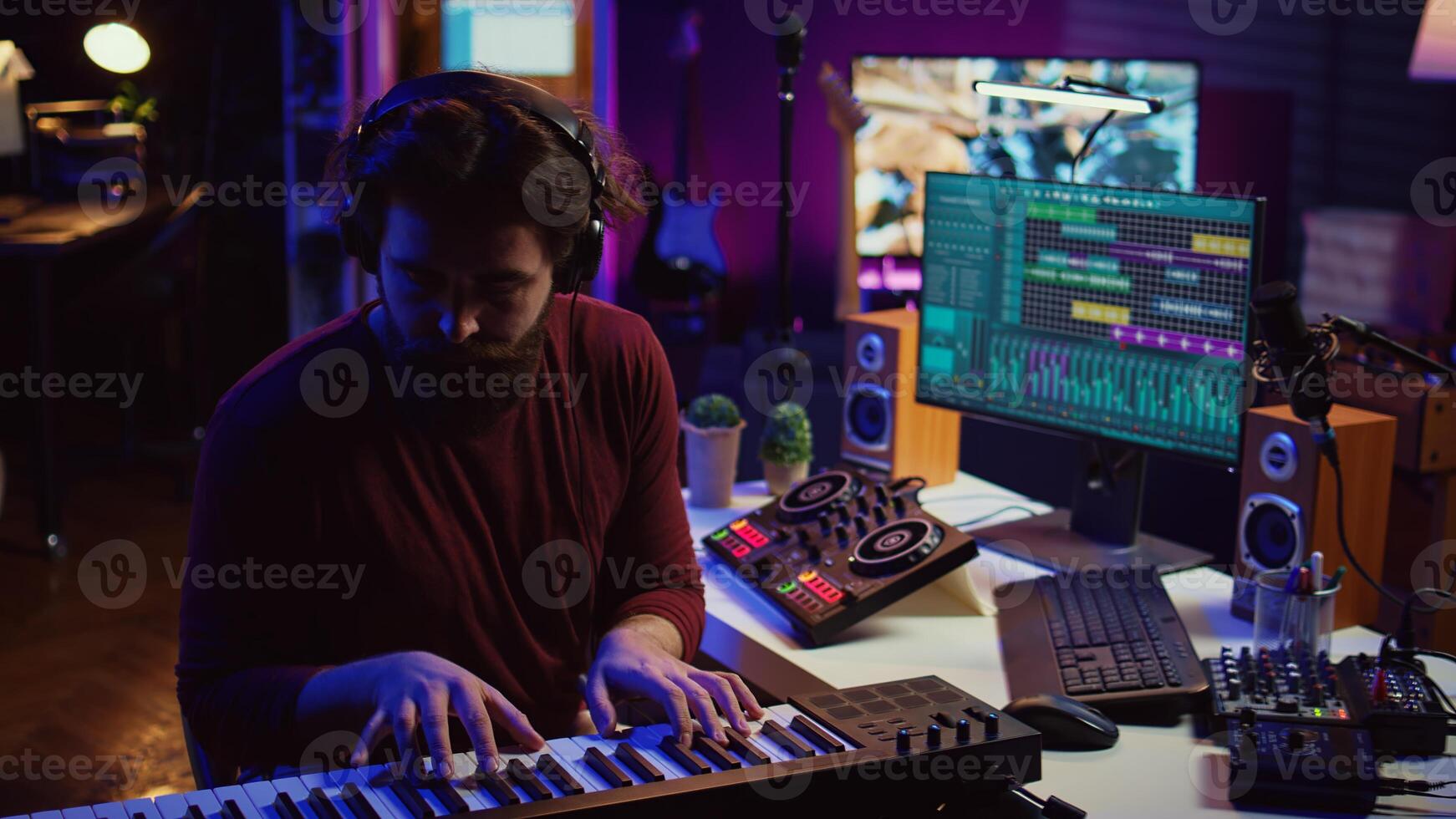 Musician producing new high quality piano tunes with daw software, recording a song with equalizer. Sound engineer creating melody to ensure high quality audio delivery, mixing console. Camera B. photo