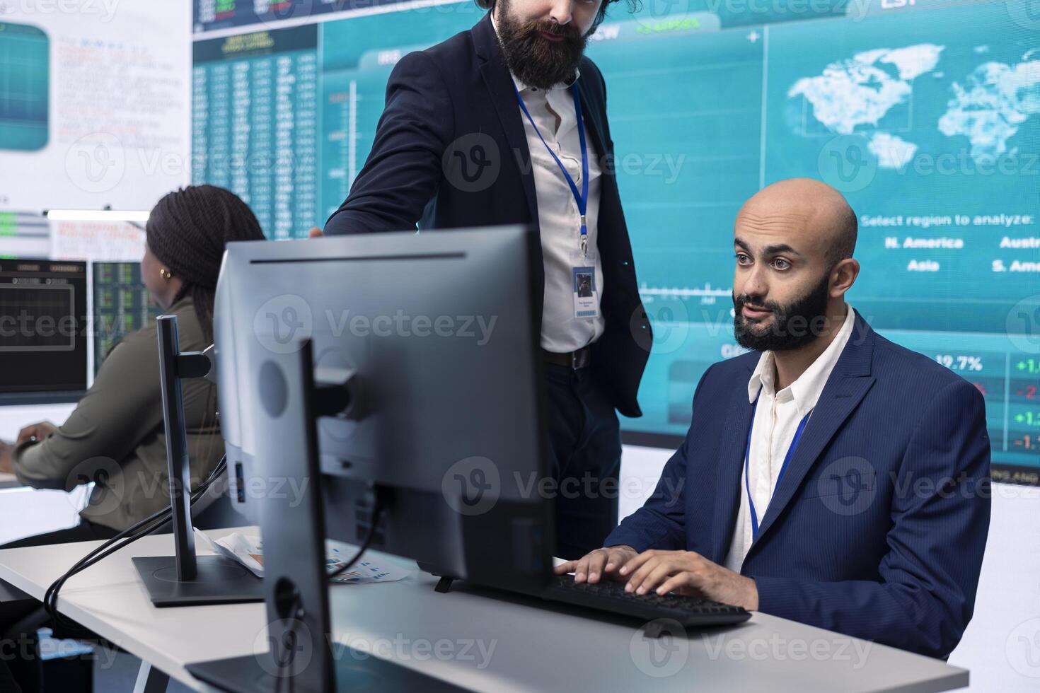 Project manager ensuring productivity and efficiency in creating annual reports, providing guidance for her staff in order to impress the shareholders. Strategic business objectives. photo