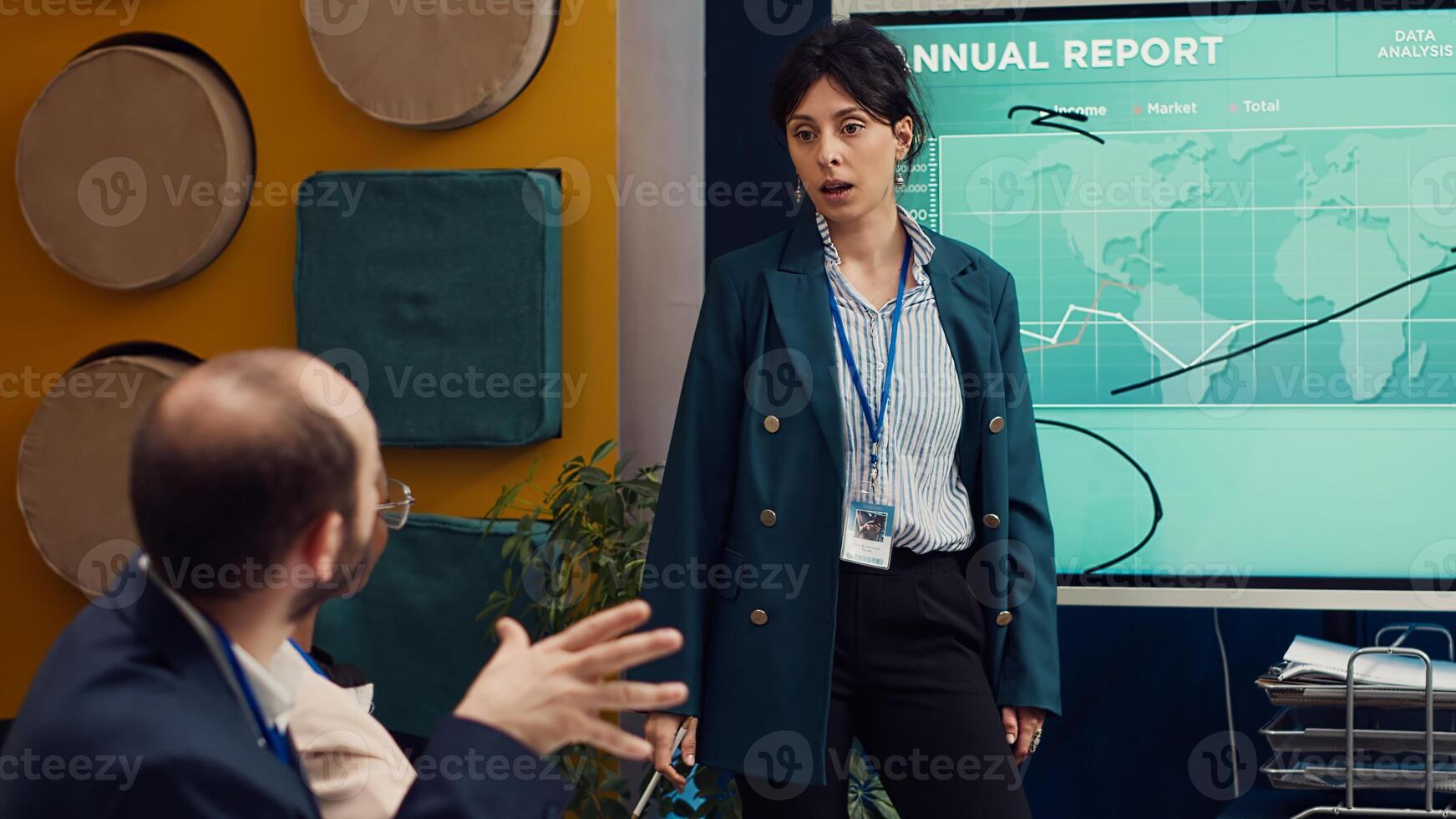 Business affiliates reviewing annual infographics reports in corporate briefing meeting, develop internal communication strategies. Startup team training to become a multinational company. Camera A. photo