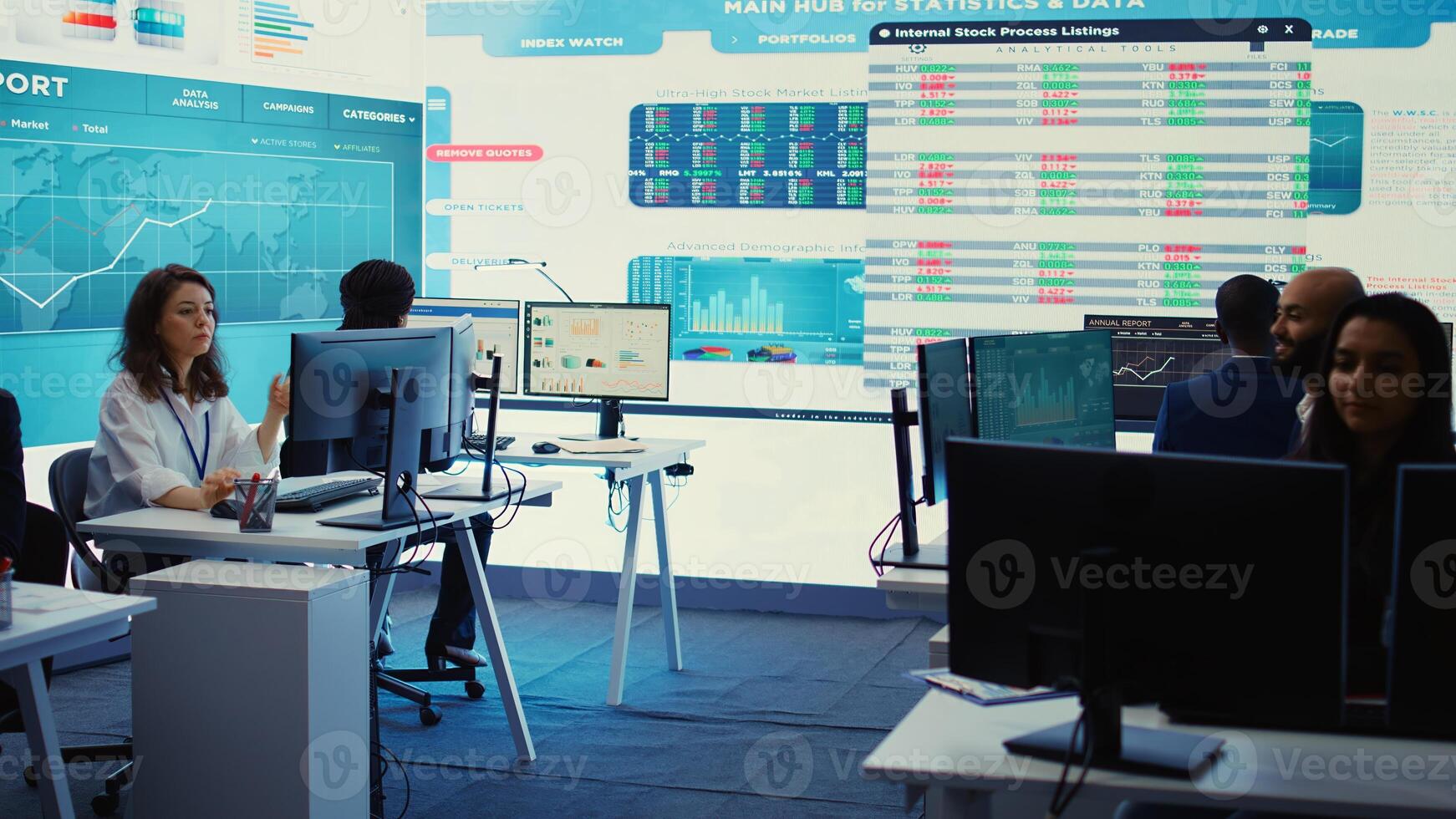 Forecast affiliates working in coworking space office to review latest business news based on performance metrics and progress. Consultants fight to expand the enterprise globally. Camera B. photo