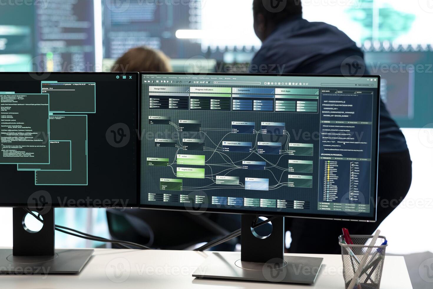 Cyber defense specialist examining information on a big screen in governmental center, focusing on cyber security operations and digital threats. Hacker ensures protection against cybercriminals. photo