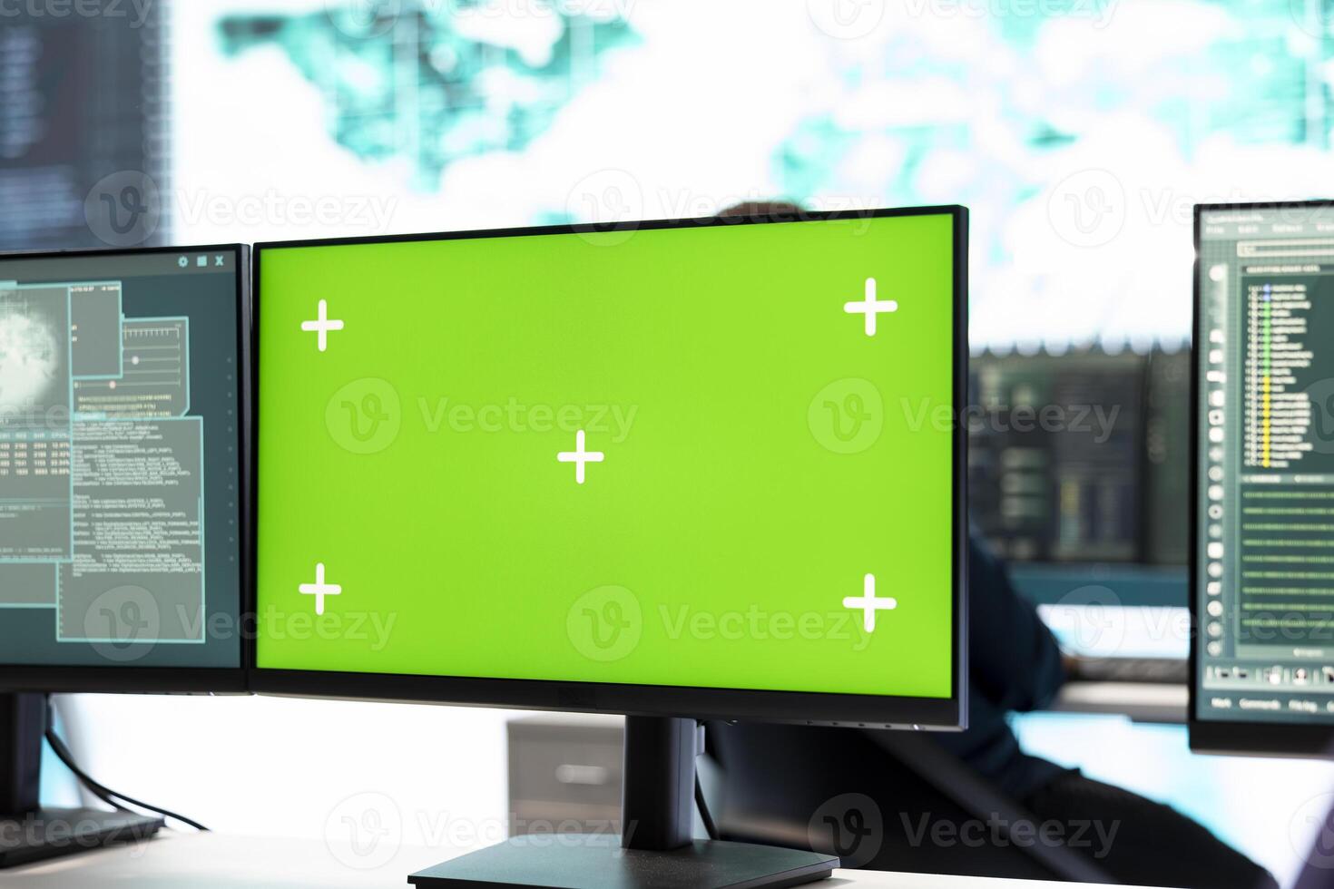 Professional team of governmental hackers conducting cyber surveillance, looks at isolated copy space screen. Expert examines cybersecurity measures and online security in high tech agency. photo