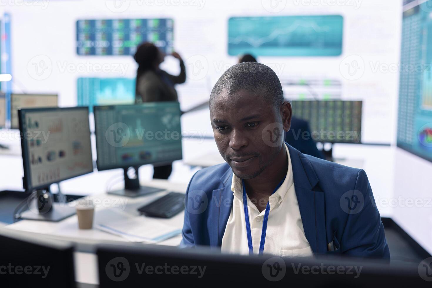 Skilled general manager examining company numbers to calculate profit in order to invest in business expansion. Analyst reviewing firm productivity and efficiency to achieve goals. photo