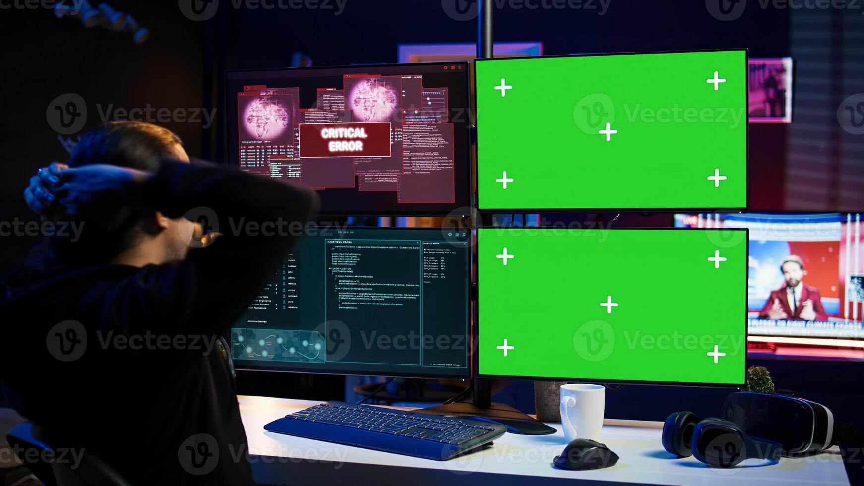 Scammer hacking using green screen PC and getting critical error notification while trying to infiltrate banking systems. Hacker runs script on chroma key display, failing to breach firewall, camera B photo