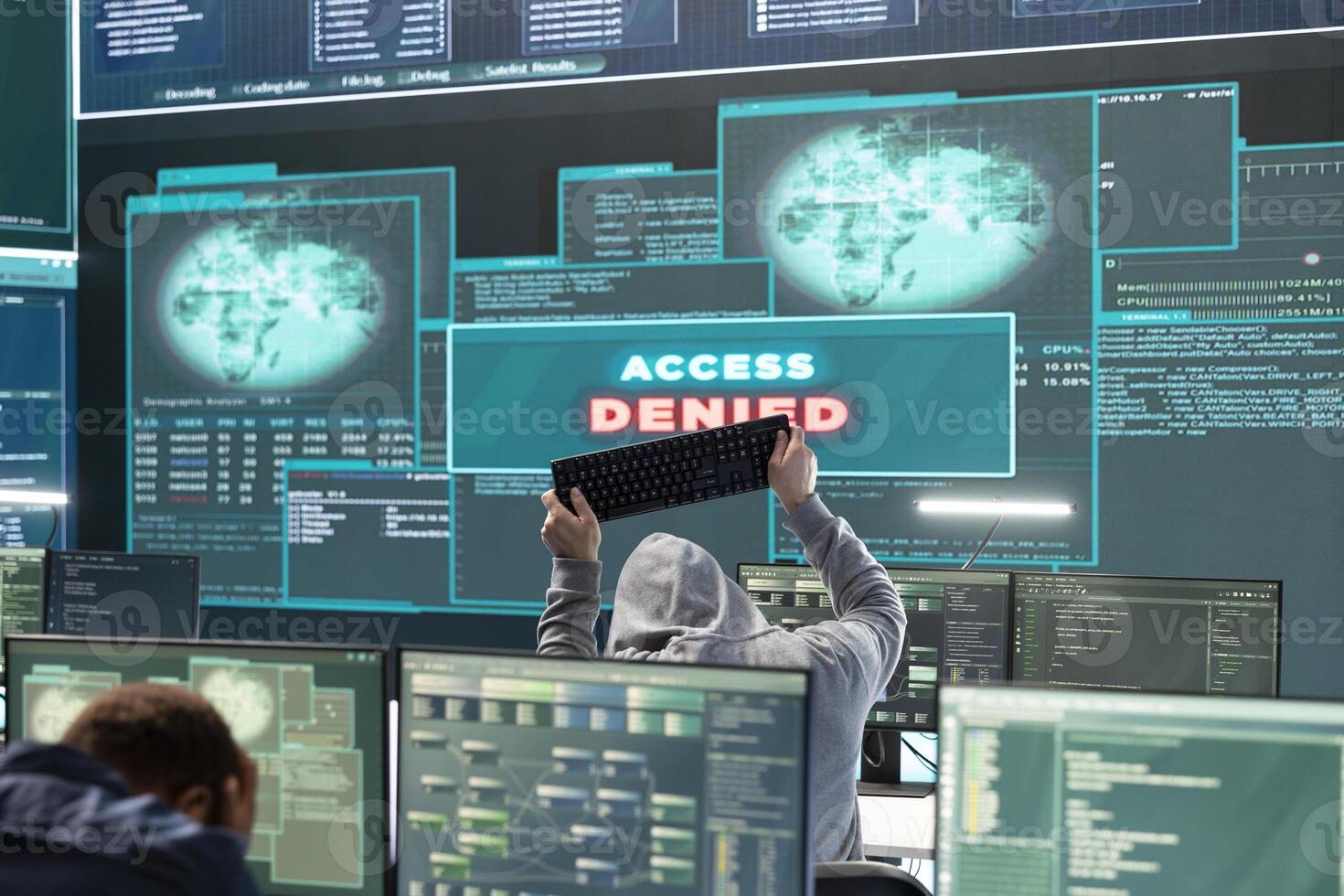 Displeased irritated team of hackers with denied access message on a big screen in governmental operations agency. Experts struggling to break into databases and steal server information. photo