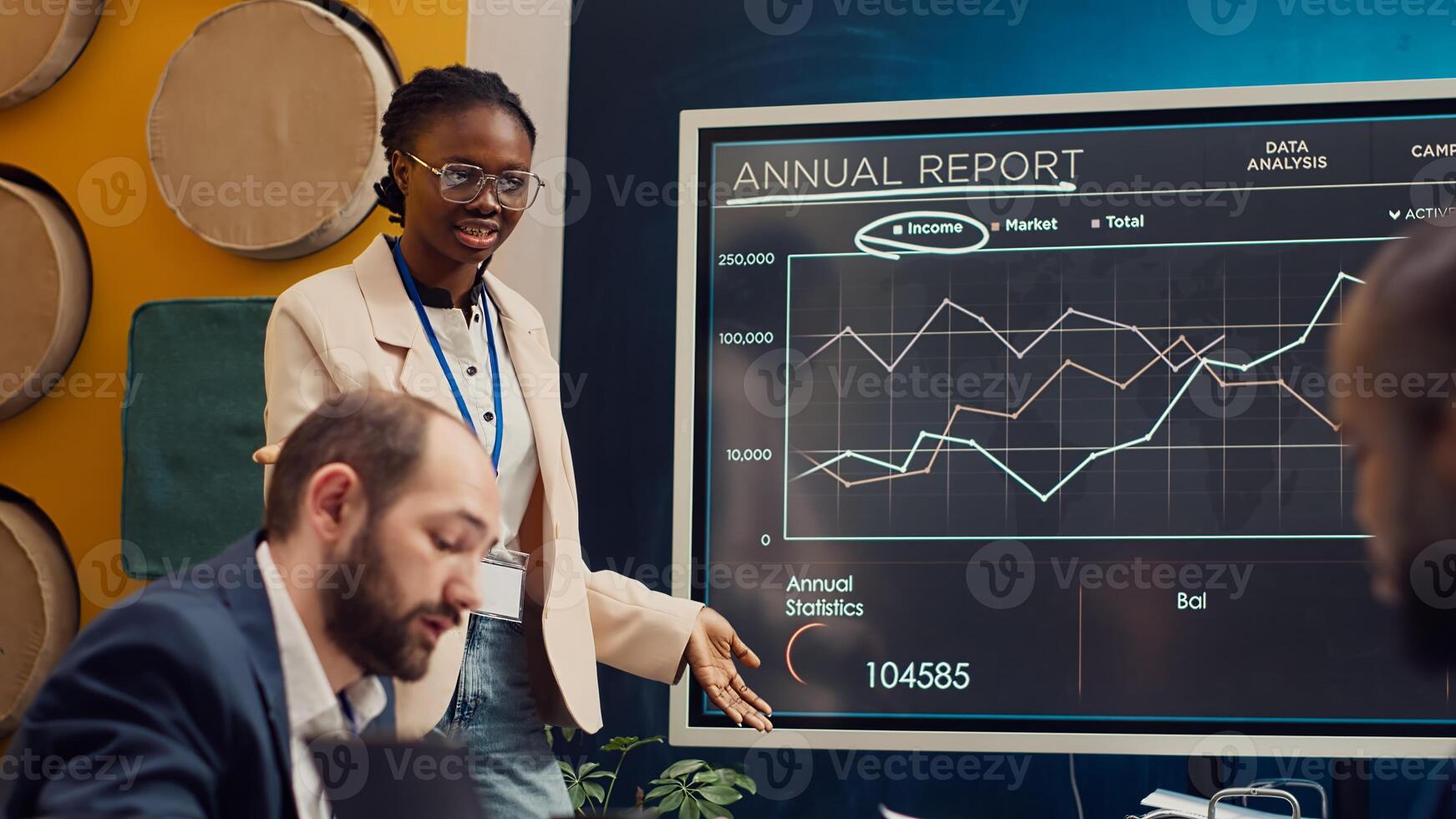 Startup team reviewing annual reports infographics on interactive board, studying market entry approaches and demands to facilitate global growth. Business employees accomplish goals. Camera A. photo