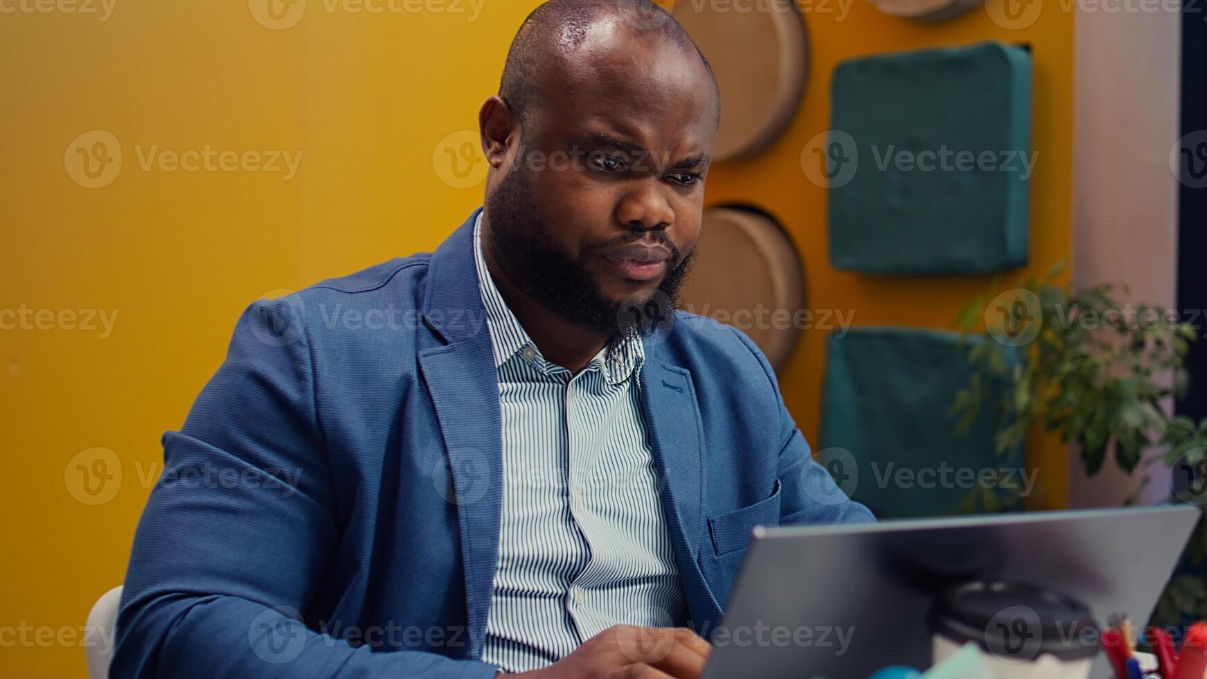 Sales representative review financial reports and performance metrics with archived statistics, looking for business expansion opportunities. Training to become a multinational company. Camera B. photo
