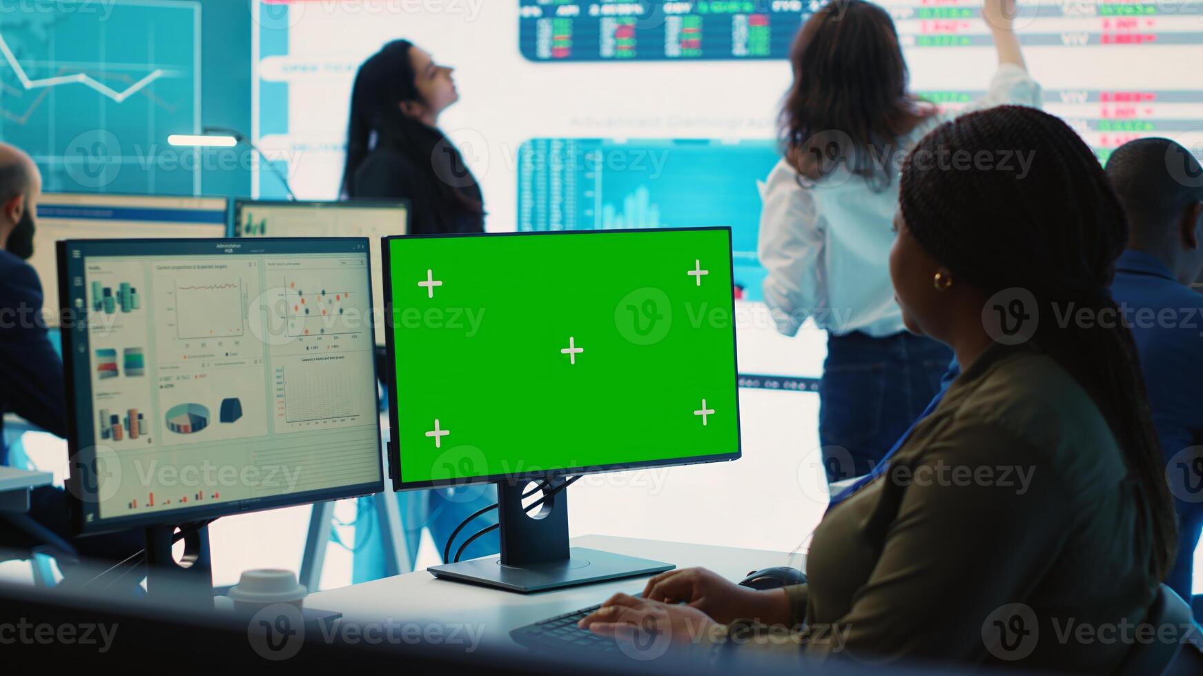 Business analyst examining monthly results and performance metrics online, isolated screen in multinational company headquarters. Consultant reviews income and expenditure budget. Camera A. photo