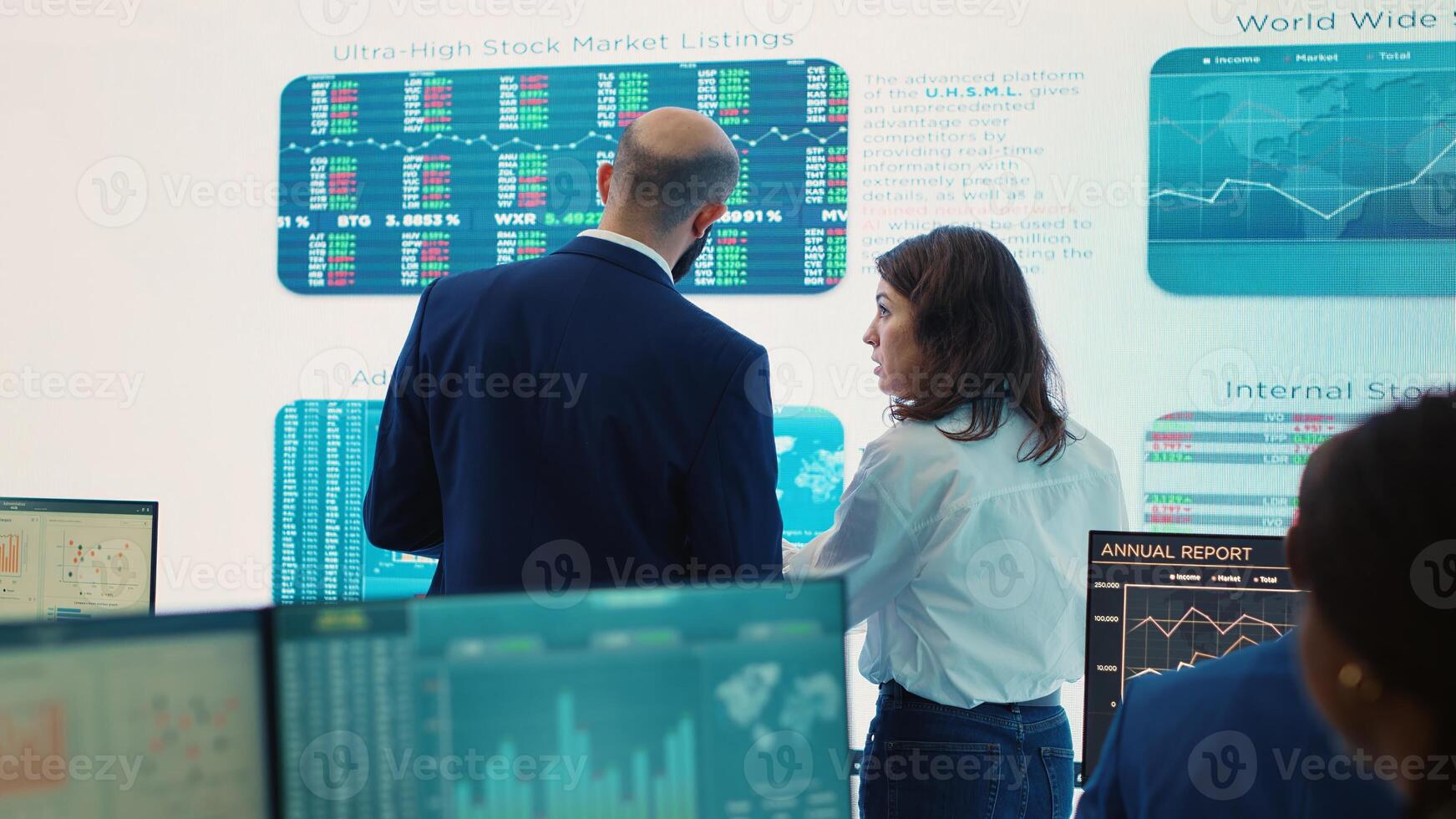 Forecast affiliates deciding new direction to improve business efficiency, reviewing latest enterprise news and progress. Worker and general director working to expand the company. Camera A. photo