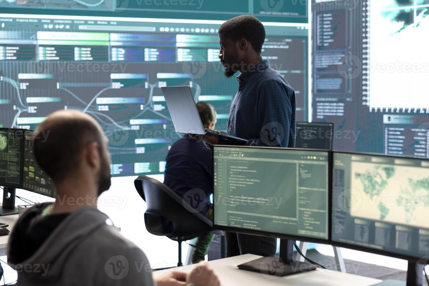 Hackers group using ransomware and phishing tactics to compromise computer networks and gather intelligence for national security and protection during cyberwarfare. Governmental spyware. photo