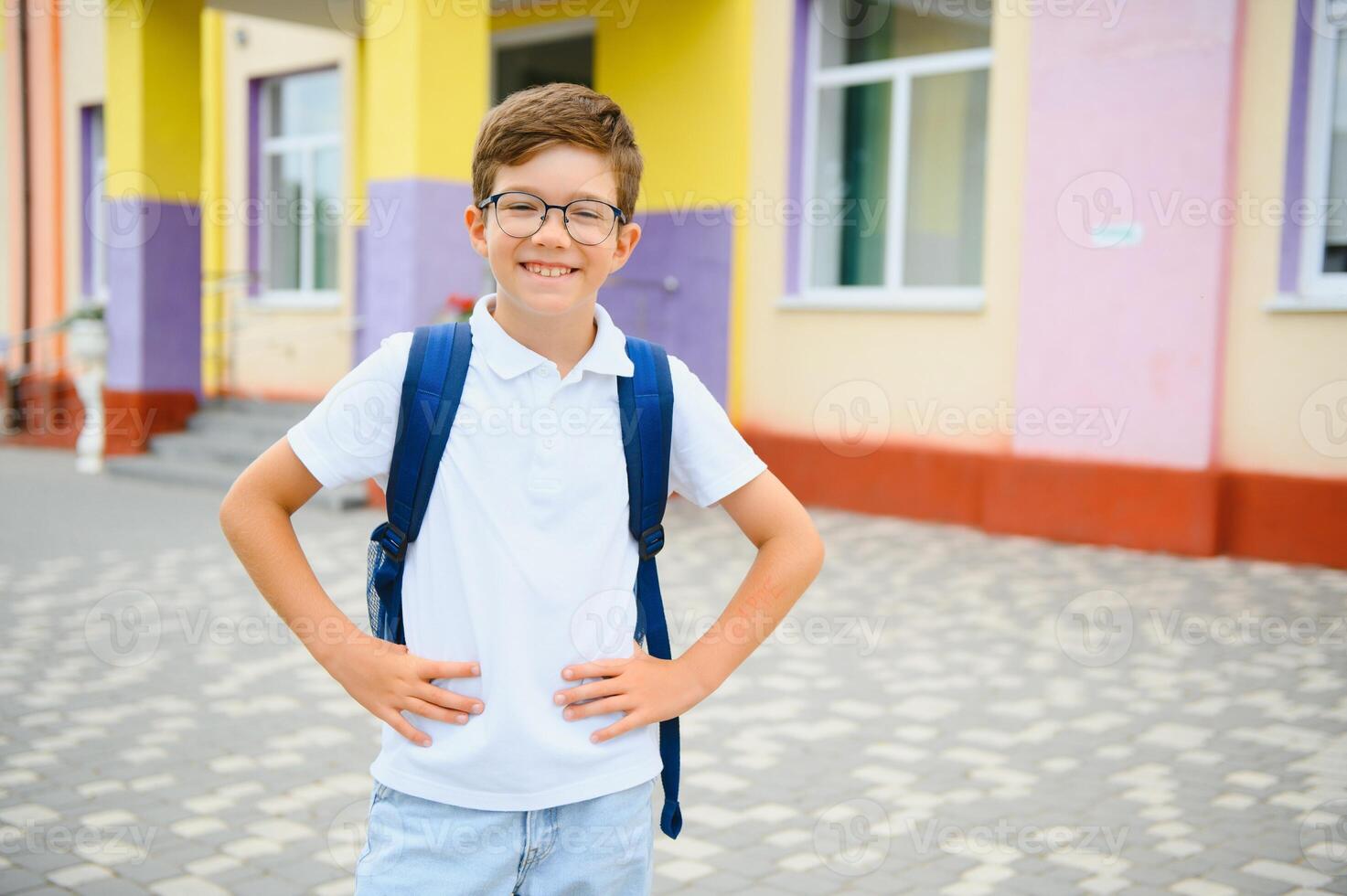 Child Riding Bicycle from School photo