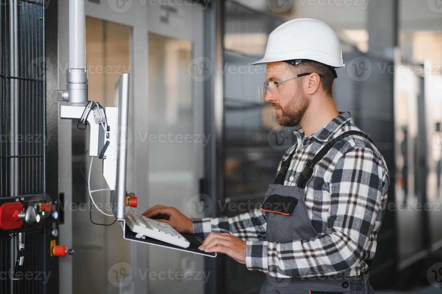 Factory worker. Man working on the production line photo