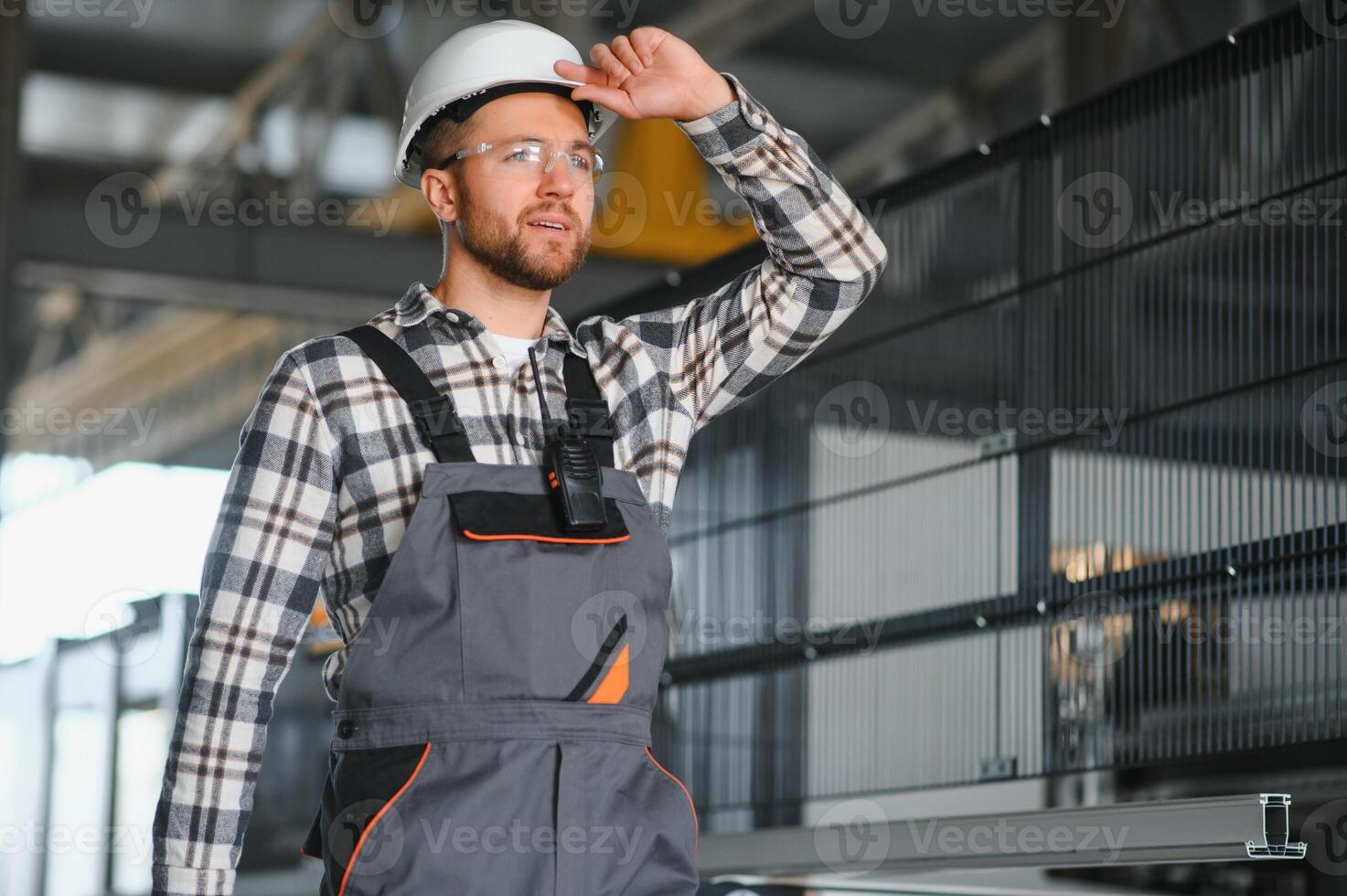 Factory worker. Man working on the production line photo