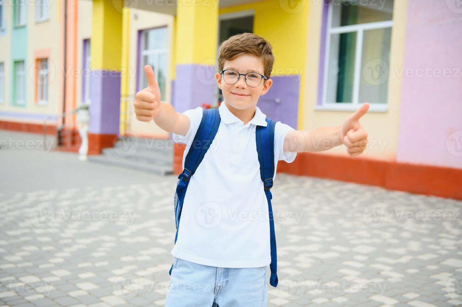 Child Riding Bicycle from School photo