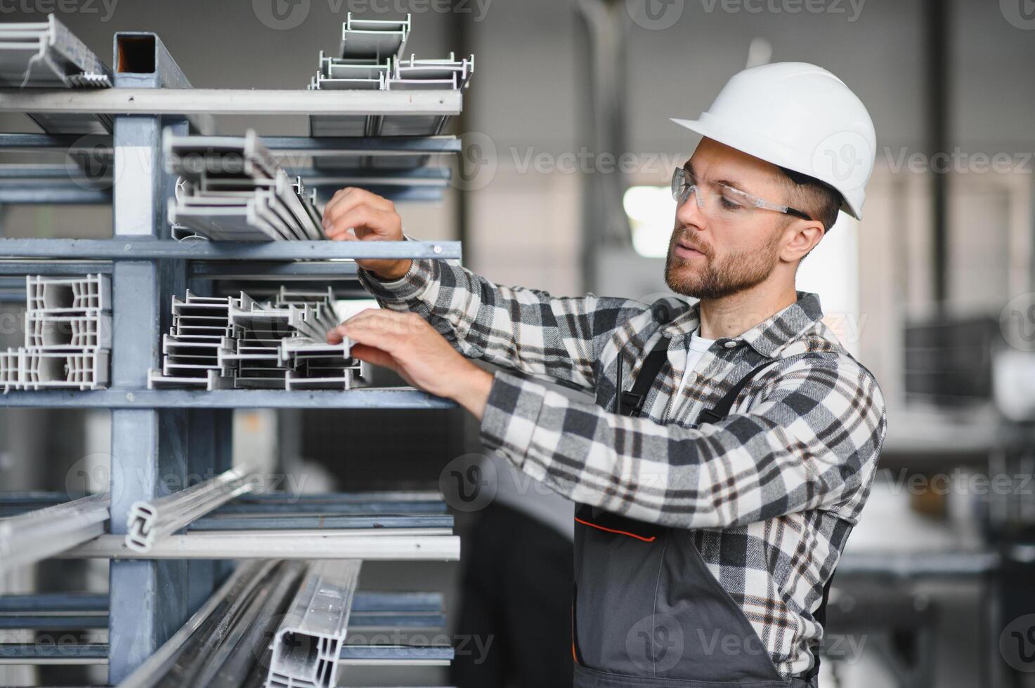 Factory worker. Man working on the production line photo