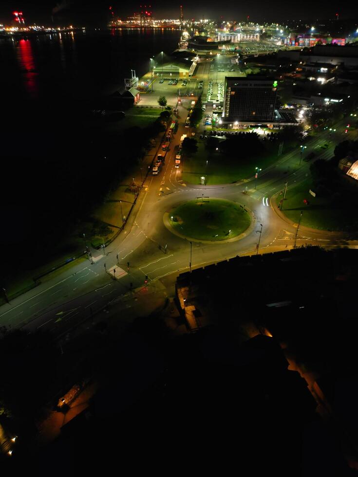 Aerial View of Illuminated Southampton Docks and Port City Centre During Dark Night. England United Kingdom. High Angle Drone's Camera Footage Captured from High Altitude on May 16th, 2024 photo