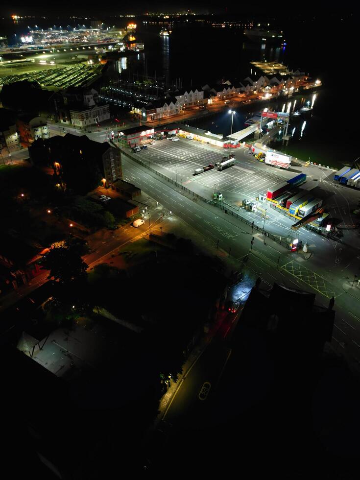 Aerial View of Illuminated Southampton Docks and Port City Centre During Dark Night. England United Kingdom. High Angle Drone's Camera Footage Captured from High Altitude on May 16th, 2024 photo