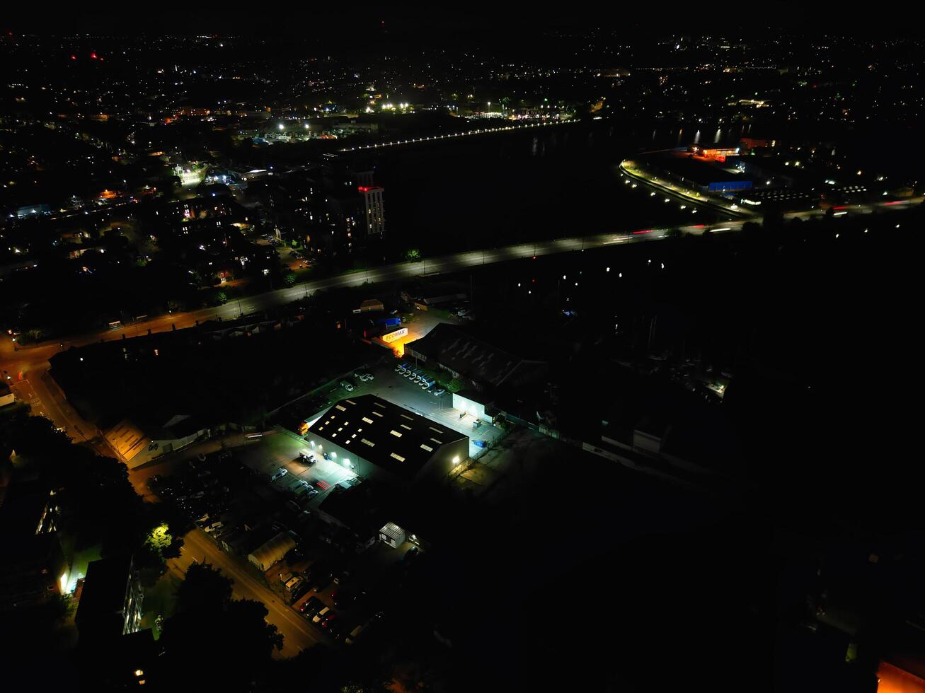 Aerial View of Illuminated Southampton Docks and Port City Centre During Dark Night. England United Kingdom. High Angle Drone's Camera Footage Captured from High Altitude on May 16th, 2024 photo