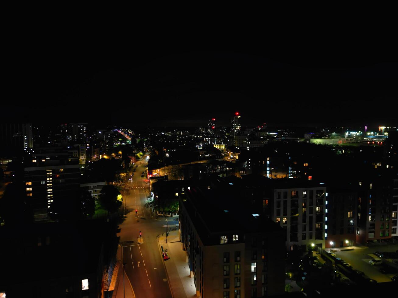 Aerial View of Illuminated Southampton Docks and Port City Centre During Dark Night. England United Kingdom. High Angle Drone's Camera Footage Captured from High Altitude on May 16th, 2024 photo
