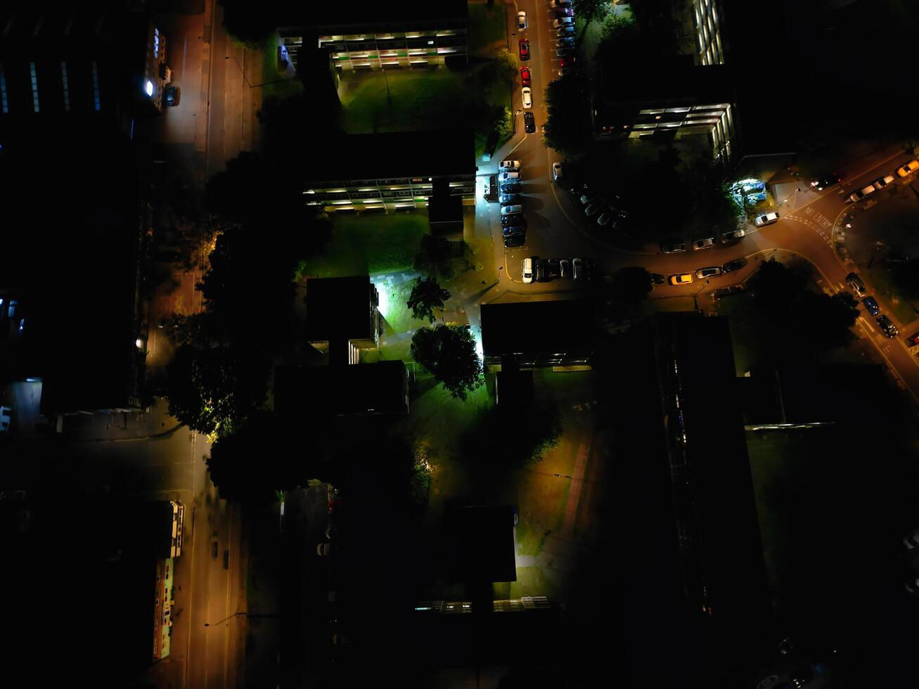 Aerial View of Illuminated Southampton Docks and Port City Centre During Dark Night. England United Kingdom. High Angle Drone's Camera Footage Captured from High Altitude on May 16th, 2024 photo
