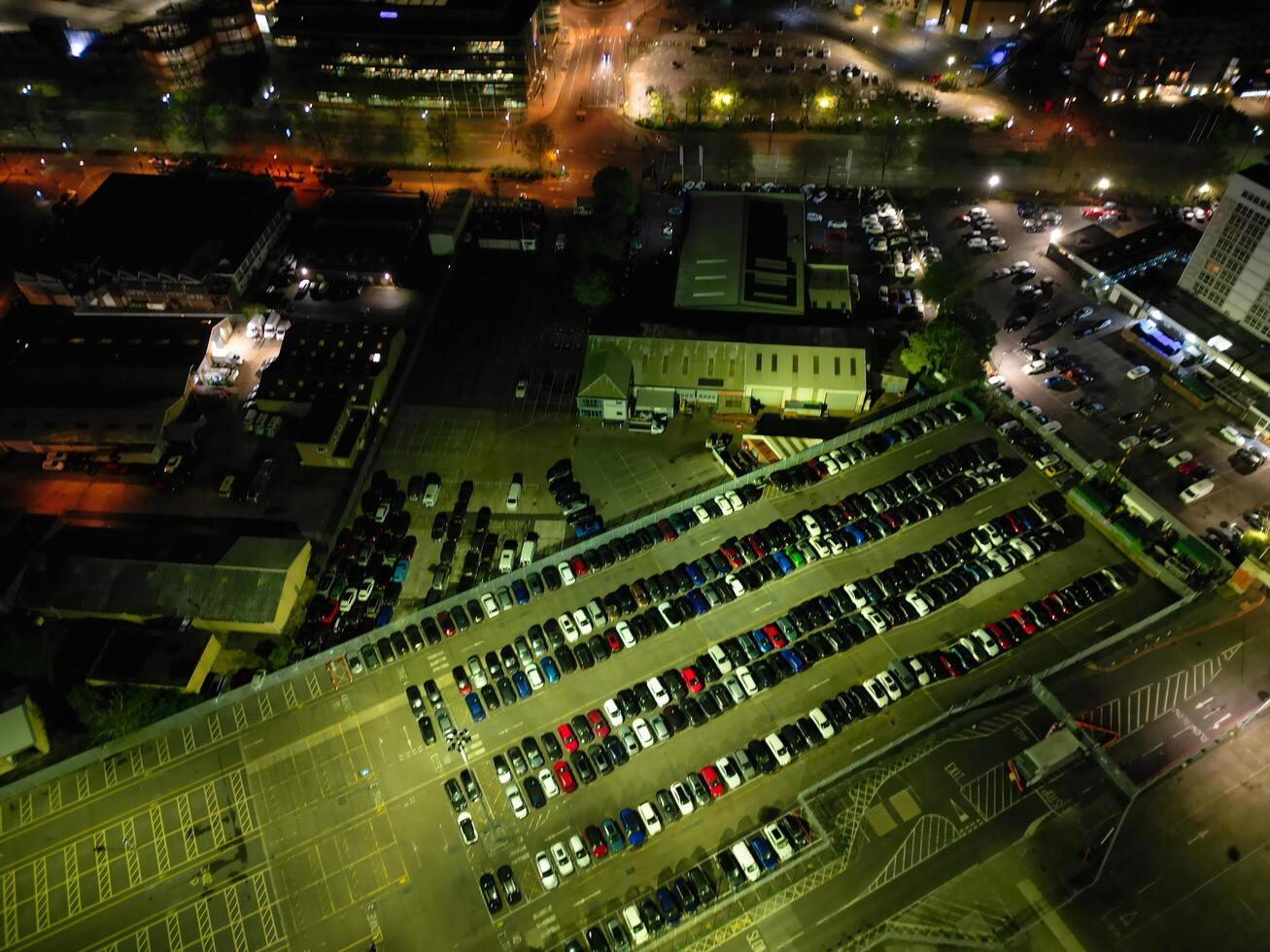 Aerial View of Illuminated Southampton Docks and Port City Centre During Dark Night. England United Kingdom. High Angle Drone's Camera Footage Captured from High Altitude on May 16th, 2024 photo