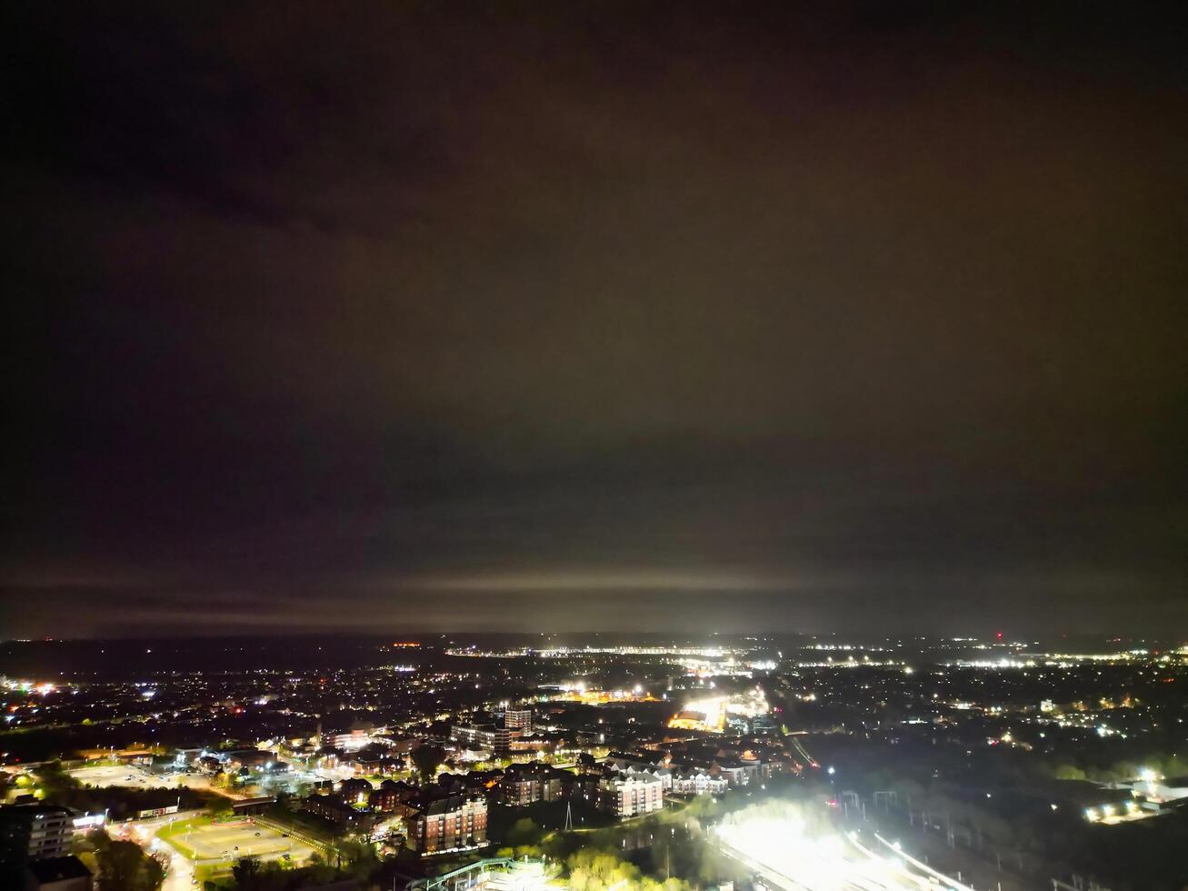 Aerial View of Illuminated Central Bedford City of England United Kingdom During Night. April 5th, 2024, High Angle Footage Was Captured after Sunset and Beginning of Night with Drone's Camera photo