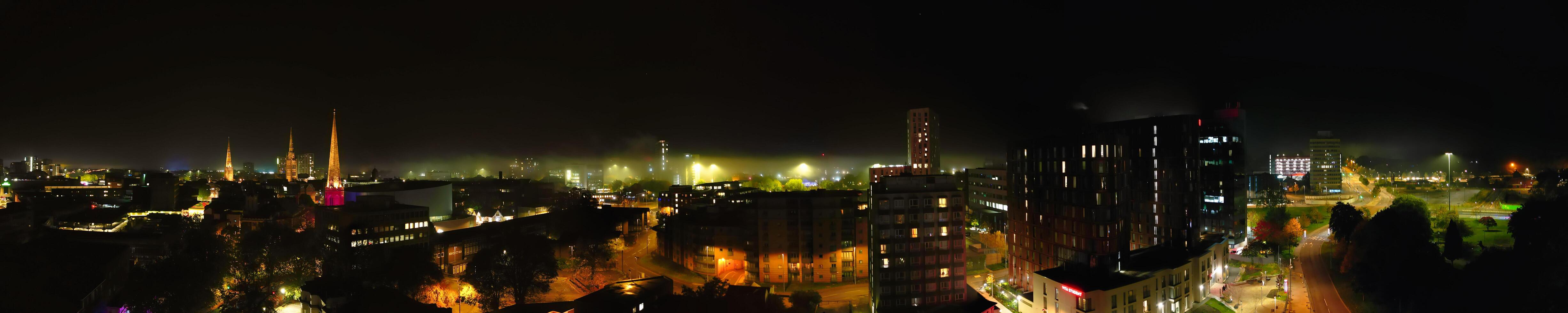 Aerial View of Illuminated Historical Central Coventry City Centre Downtown of England United Kingdom. Night view Captured on After Midnight with Drone's Camera on October 23rd, 2024 photo