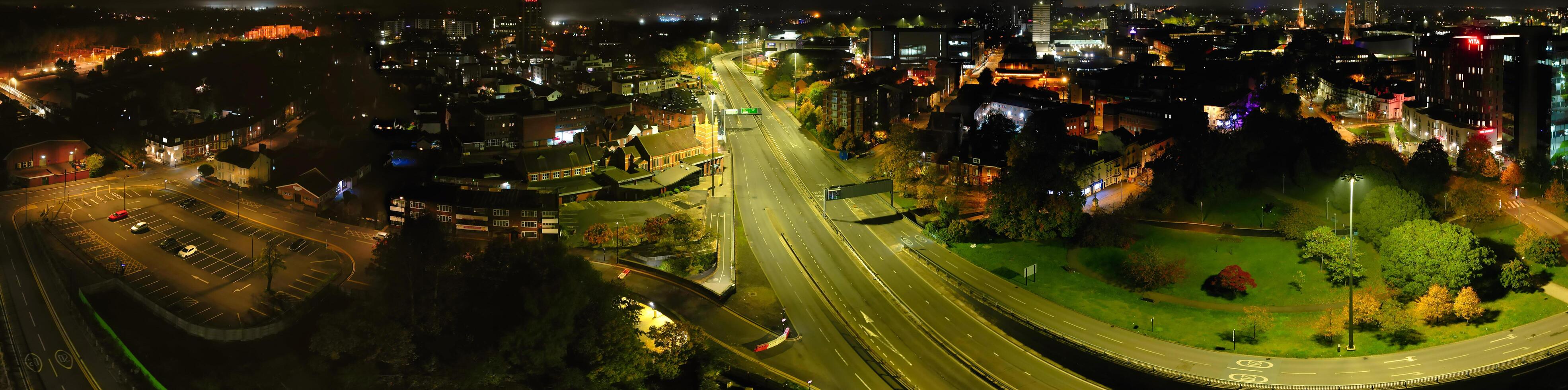 Aerial View of Illuminated Historical Central Coventry City Centre Downtown of England United Kingdom. Night view Captured on After Midnight with Drone's Camera on October 23rd, 2024 photo