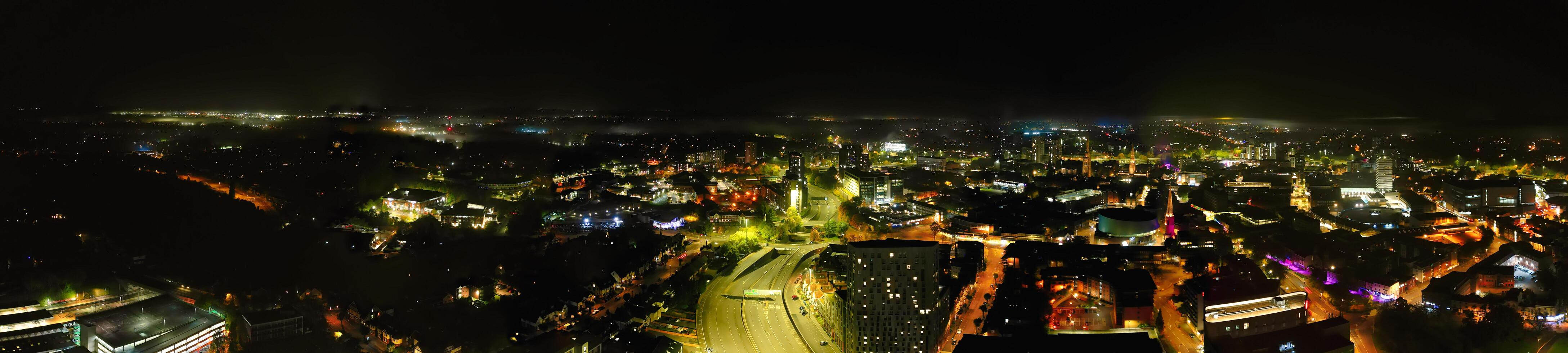 Aerial View of Illuminated Historical Central Coventry City Centre Downtown of England United Kingdom. Night view Captured on After Midnight with Drone's Camera on October 23rd, 2024 photo