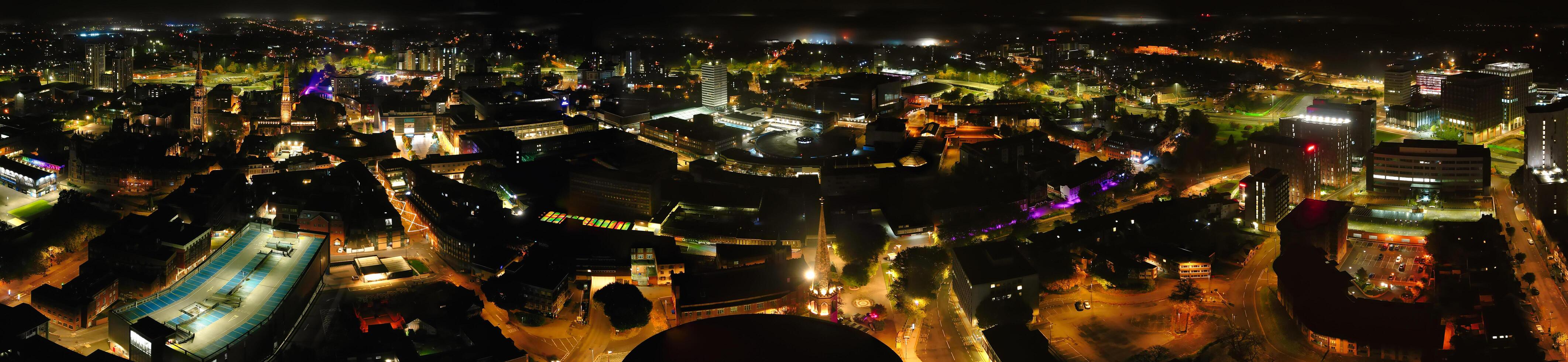 Aerial View of Illuminated Historical Central Coventry City Centre Downtown of England United Kingdom. Night view Captured on After Midnight with Drone's Camera on October 23rd, 2024 photo