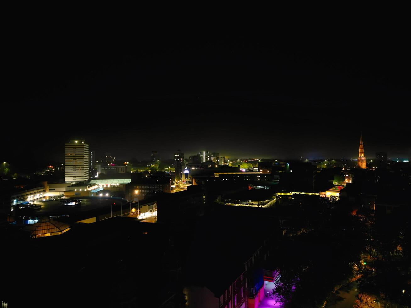 Aerial View of Illuminated Historical Central Coventry City Centre Downtown of England United Kingdom. Night view Captured on After Midnight with Drone's Camera on October 23rd, 2024 photo