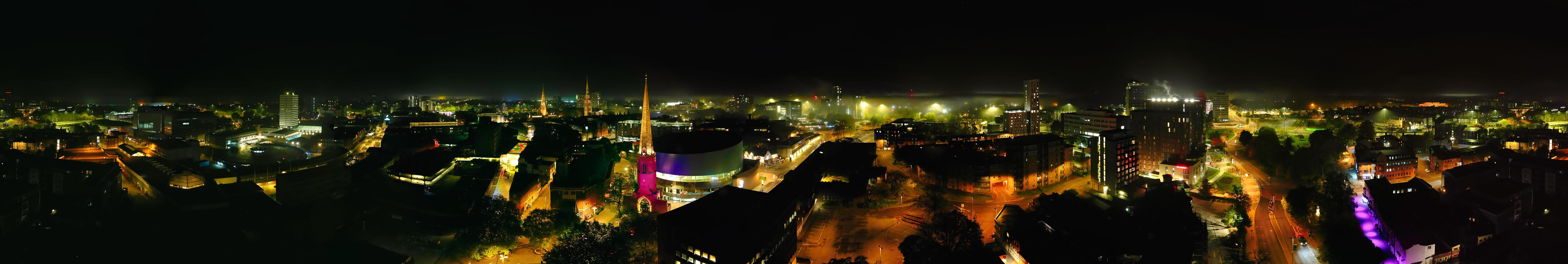 Aerial View of Illuminated Historical Central Coventry City Centre Downtown of England United Kingdom. Night view Captured on After Midnight with Drone's Camera on October 23rd, 2024 photo
