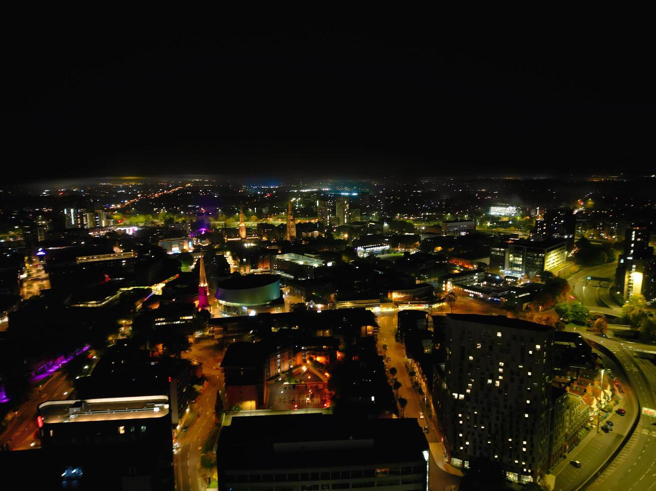High Angle View of Illuminated Historical Central Coventry City Centre Downtown of England United Kingdom. Aerial footage Was Captured on After Midnight with Drone's Camera on October 23rd, 2024 photo