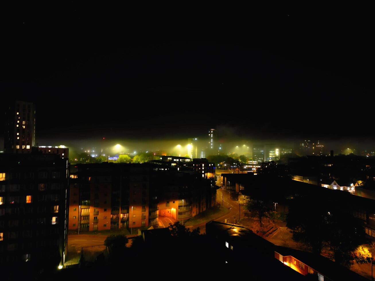 High Angle View of Illuminated Historical Central Coventry City Centre Downtown of England United Kingdom. Aerial footage Was Captured on After Midnight with Drone's Camera on October 23rd, 2024 photo