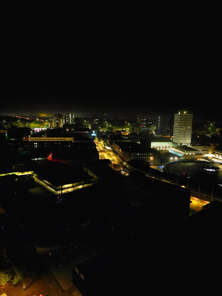 High Angle View of Illuminated Historical Central Coventry City Centre Downtown of England United Kingdom. Aerial footage Was Captured on After Midnight with Drone's Camera on October 23rd, 2024 photo