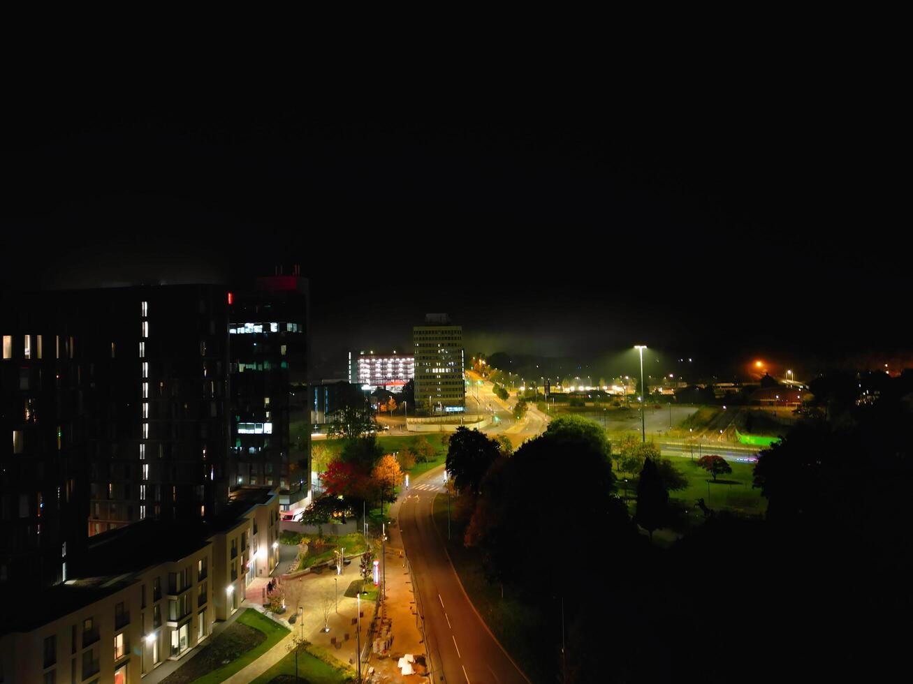 High Angle View of Illuminated Historical Central Coventry City Centre Downtown of England United Kingdom. Aerial footage Was Captured on After Midnight with Drone's Camera on October 23rd, 2024 photo