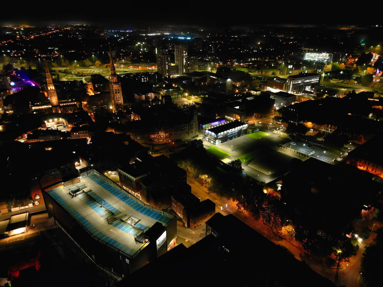High Angle View of Illuminated Historical Central Coventry City Centre Downtown of England United Kingdom. Aerial footage Was Captured on After Midnight with Drone's Camera on October 23rd, 2024 photo