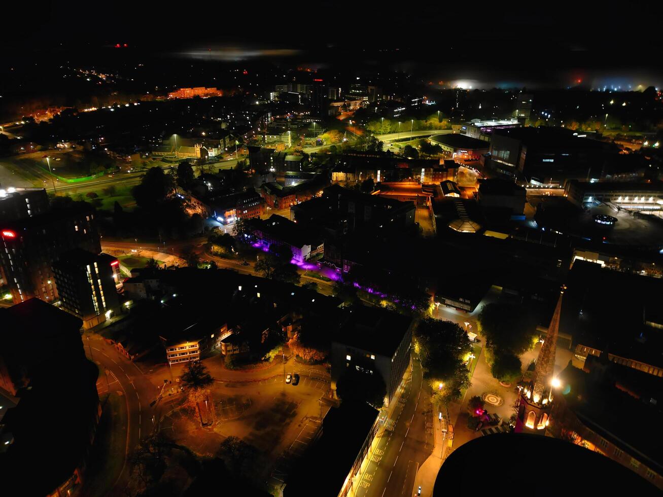 High Angle View of Illuminated Historical Central Coventry City Centre Downtown of England United Kingdom. Aerial footage Was Captured on After Midnight with Drone's Camera on October 23rd, 2024 photo