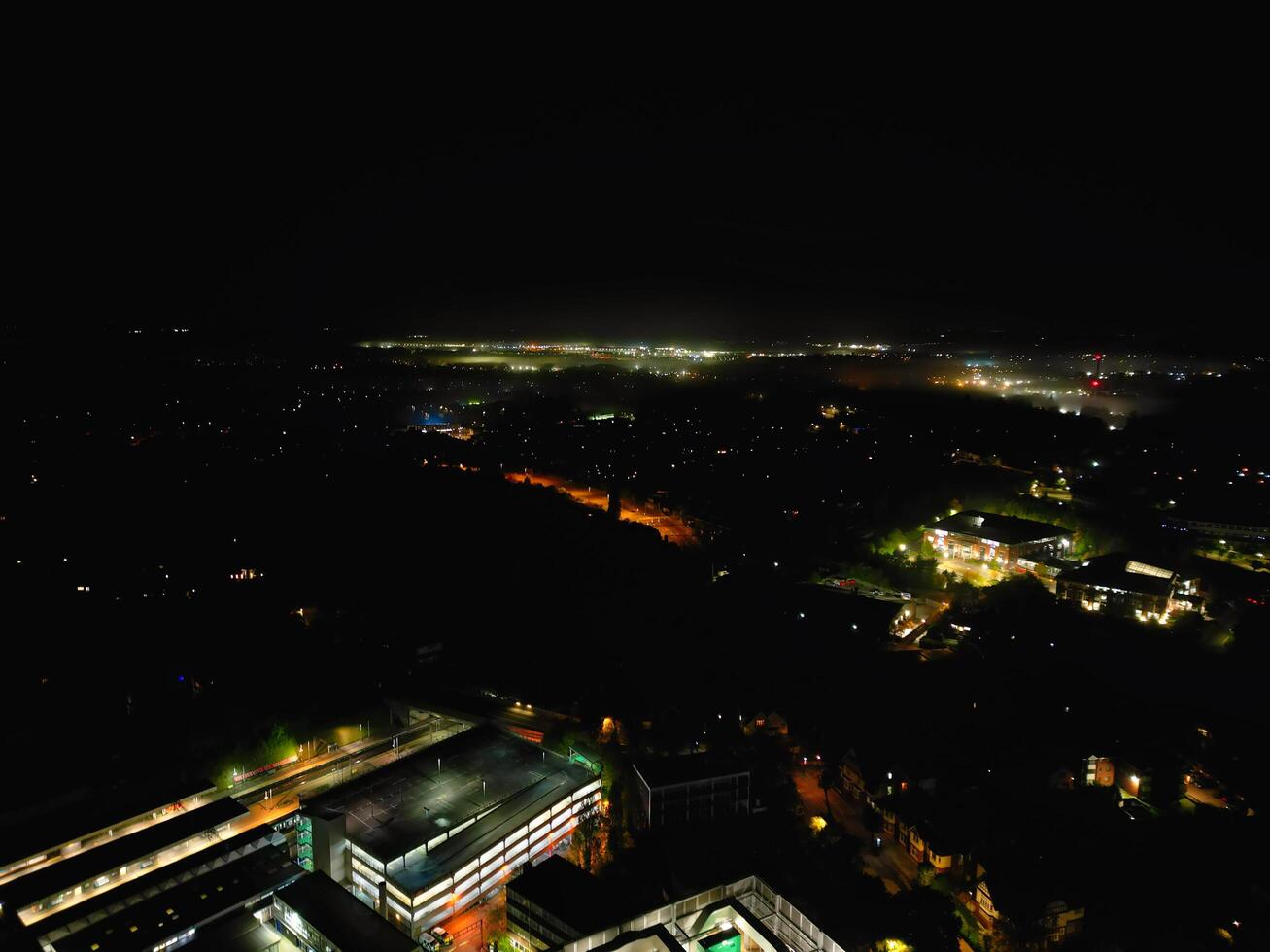 High Angle View of Illuminated Historical Central Coventry City Centre Downtown of England United Kingdom. Aerial footage Was Captured on After Midnight with Drone's Camera on October 23rd, 2024 photo