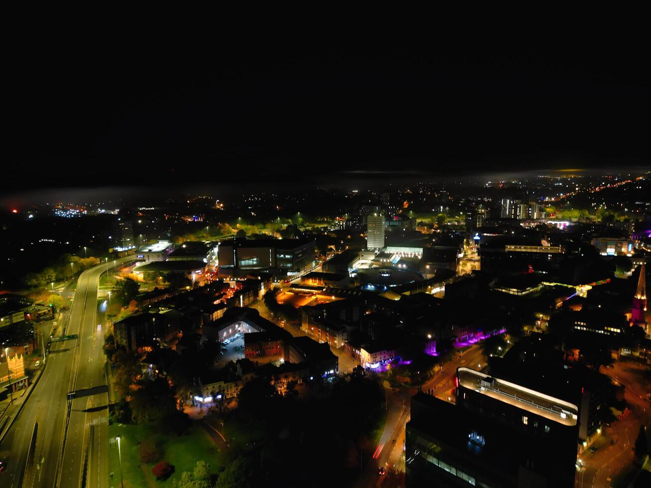 High Angle View of Illuminated Historical Central Coventry City Centre Downtown of England United Kingdom. Aerial footage Was Captured on After Midnight with Drone's Camera on October 23rd, 2024 photo