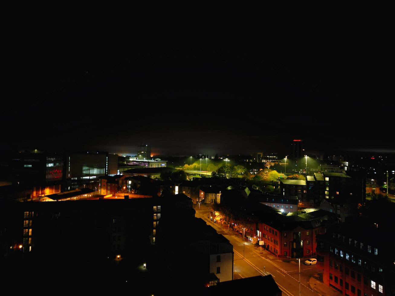 High Angle View of Illuminated Historical Central Coventry City Centre Downtown of England United Kingdom. Aerial footage Was Captured on After Midnight with Drone's Camera on October 23rd, 2024 photo