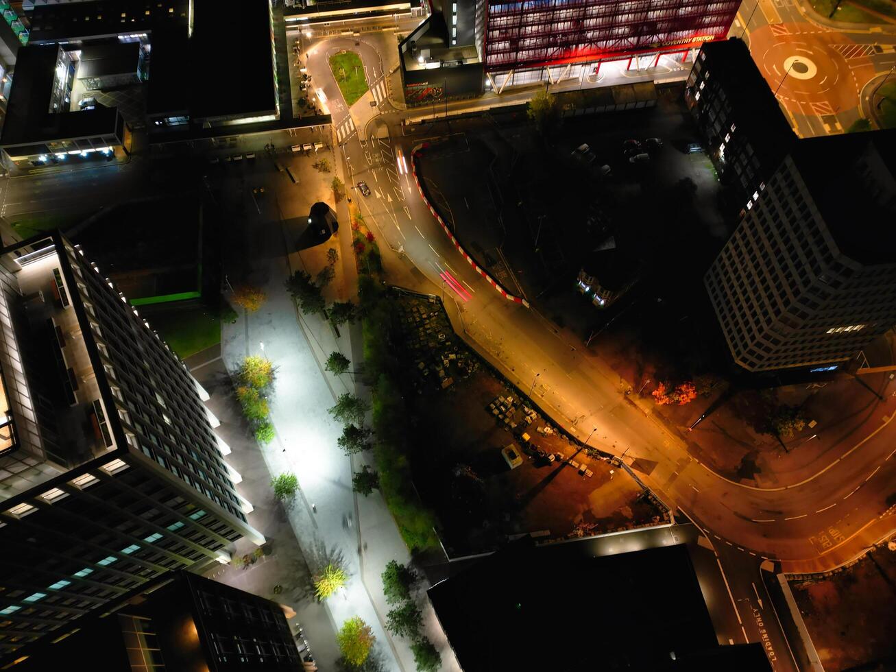 High Angle View of Illuminated Historical Central Coventry City Centre Downtown of England United Kingdom. Aerial footage Was Captured on After Midnight with Drone's Camera on October 23rd, 2024 photo