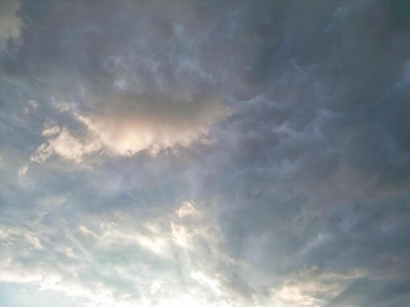 Unique and Dramatic Clouds and Sky over City of England Great Britain. Footage Was Captured with drone's Camera from High Altitude over Manchester City UK photo