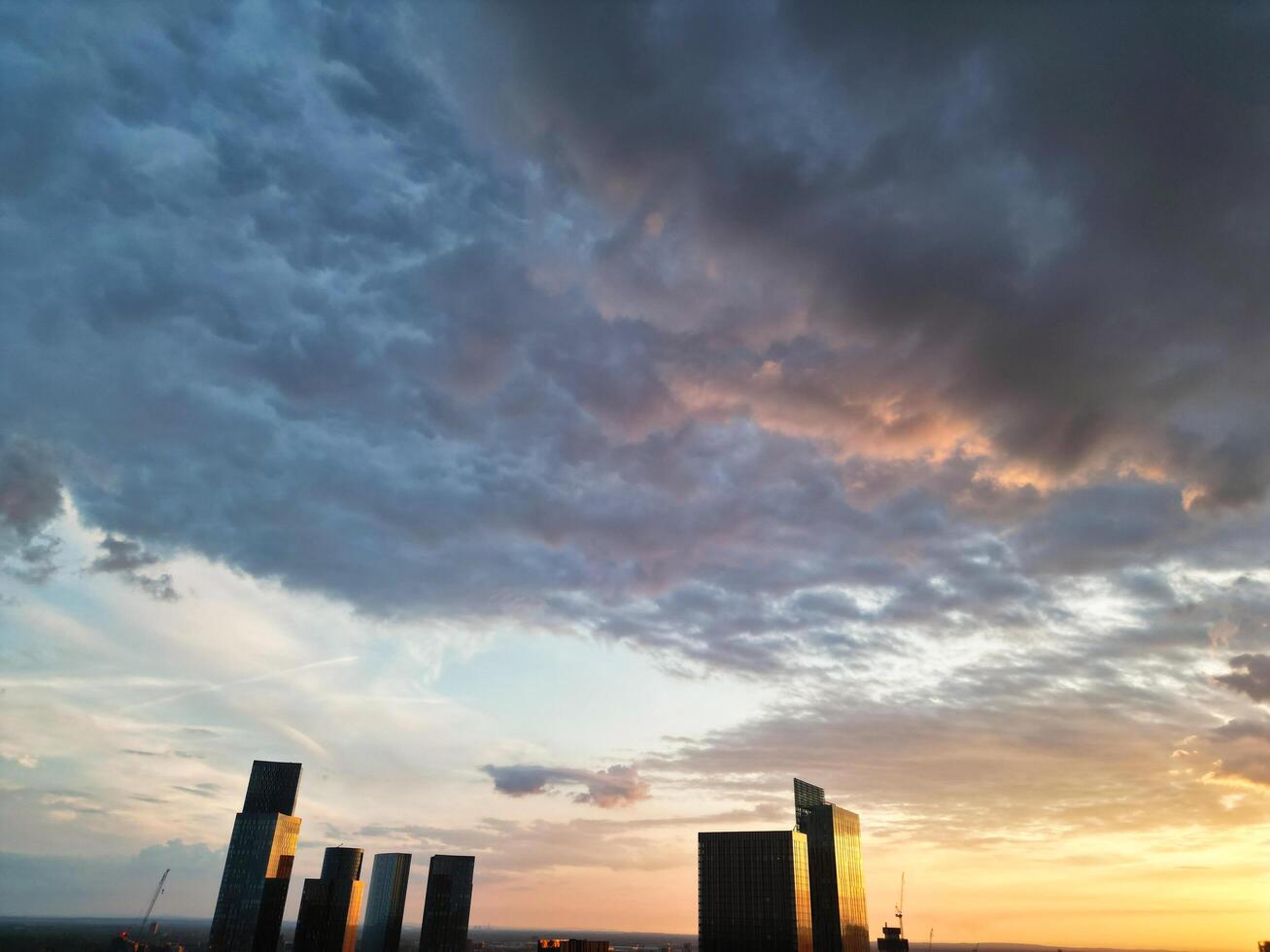 Unique and Dramatic Clouds and Sky over City of England Great Britain. Footage Was Captured with drone's Camera from High Altitude over Manchester City UK photo