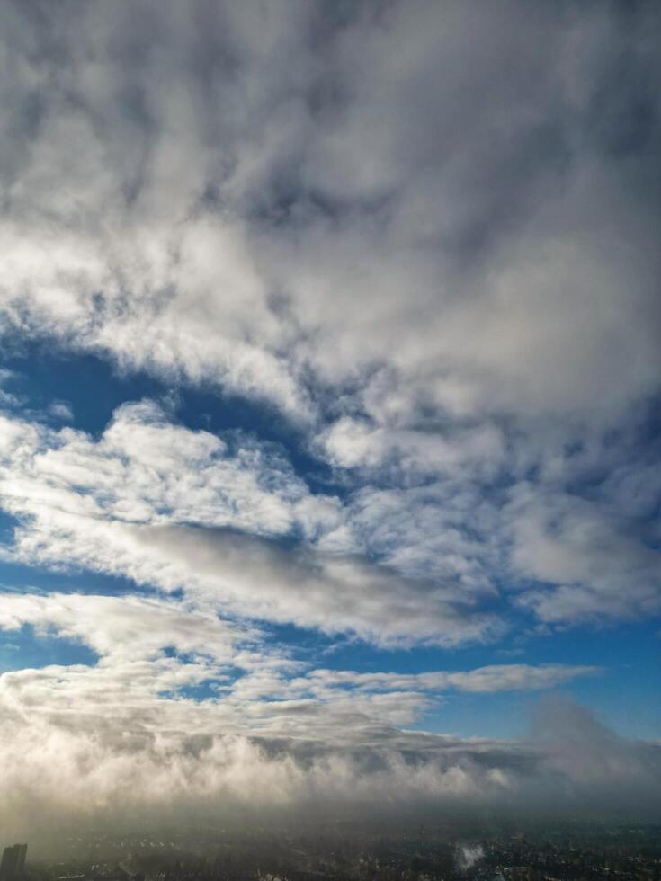 Aerial View of Manchester City During Autumn Season and Cloudy Day over England Great Britain. High Angle Drone's Camera Footage was Captured on October 29th, 2024 photo