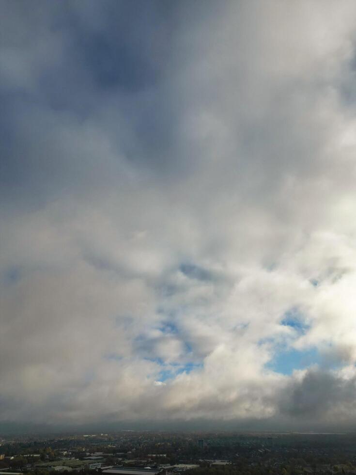 Aerial View of Manchester City During Autumn Season and Cloudy Day over England Great Britain. High Angle Drone's Camera Footage was Captured on October 29th, 2024 photo